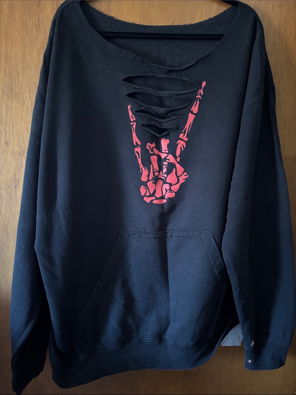 The Drive Clothing Black Crewneck Sweater with Red Skeleton Hand Graphic
